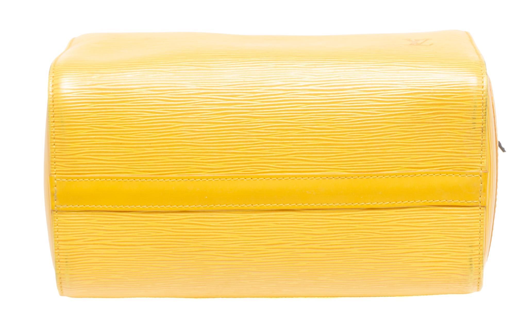 At Auction: Louis Vuitton Yellow Epi Leather Speedy 25