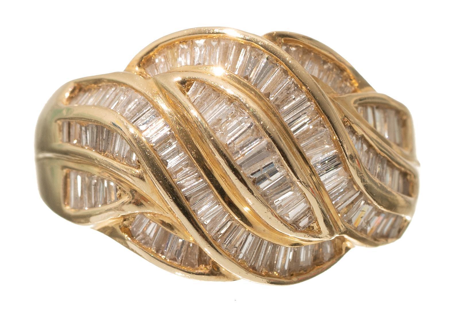 Sold at Auction: HERMES 14K GOLD SCARF RING.