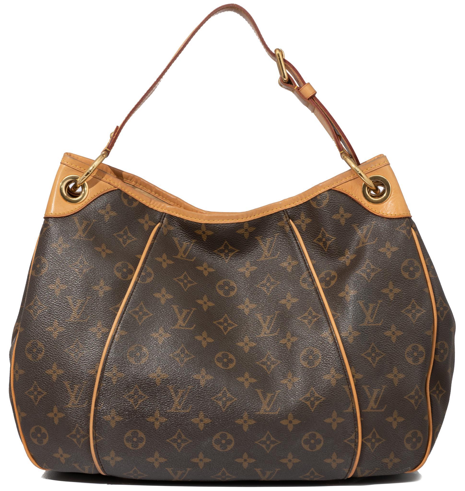 Sold at Auction: Louis Vuitton - Bucket Bag - Brown Monogram - Tan