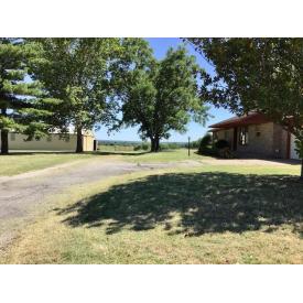 COURT ORDERED TRUSTEE'S REAL ESTATE AUCTION ∞ 78.94 ACRES± & IMPROVEMENTS NEAR OOLOGAH