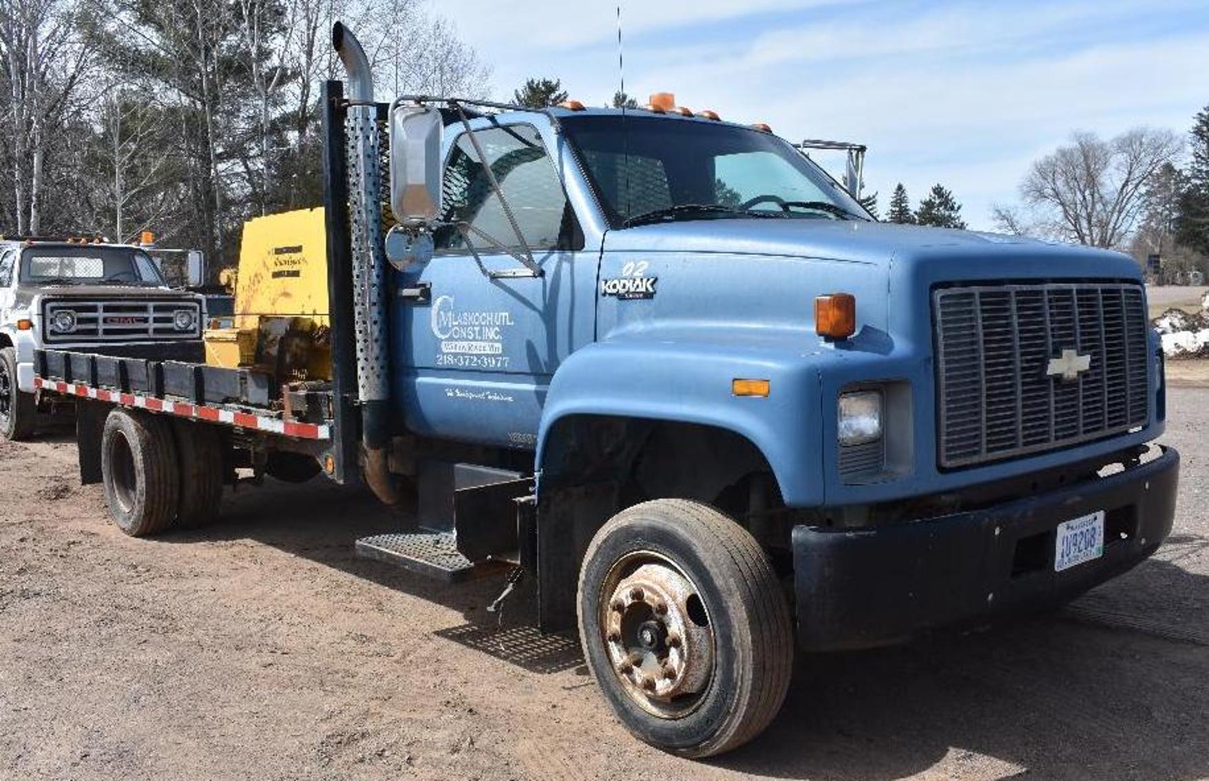 Utility Contractor Equipment: Trucks, Trenchers and Pole Trailer
