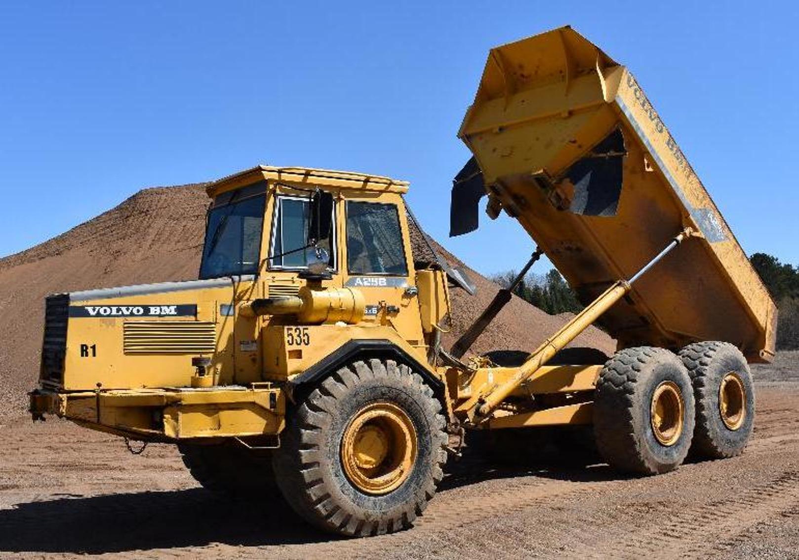 Excavating, Gravel Pit, AG Equipment: Volvo Off Road Dump Truck, Ford Dump Truck, Powerscreen, Cat 950 Loader