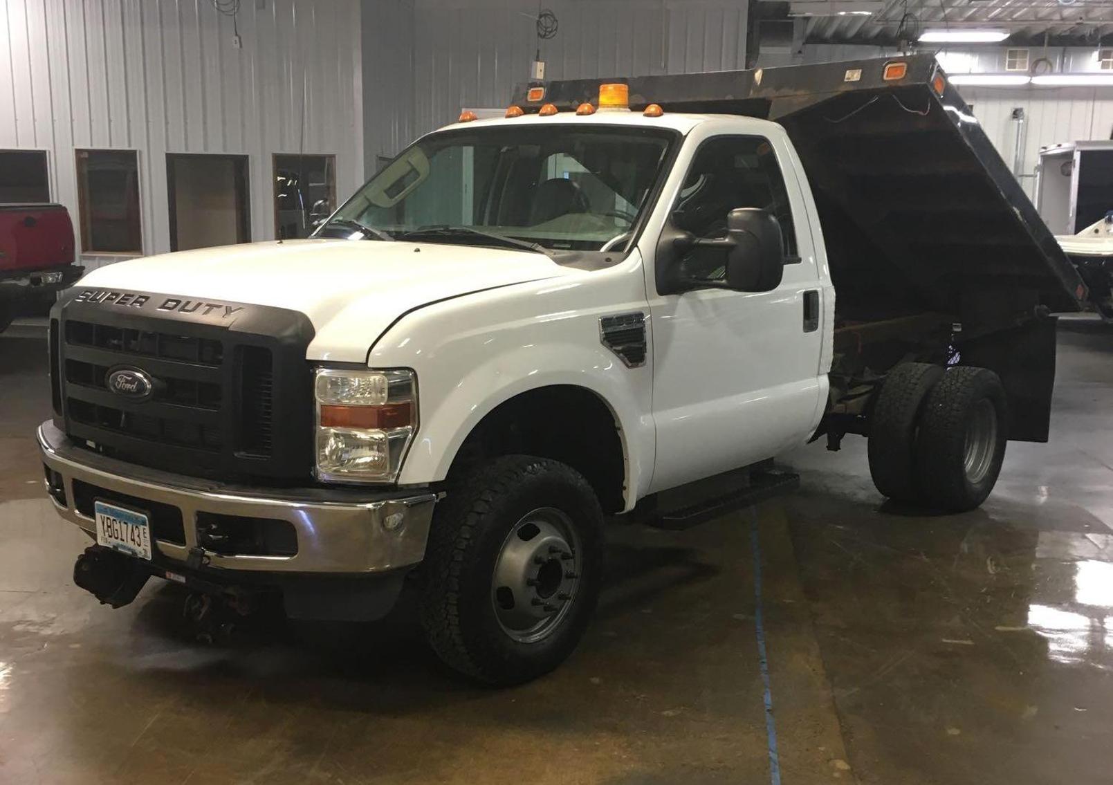 (3) Ford F-350's, (2) Chevrolet 3500's and Dodge Ram 2500