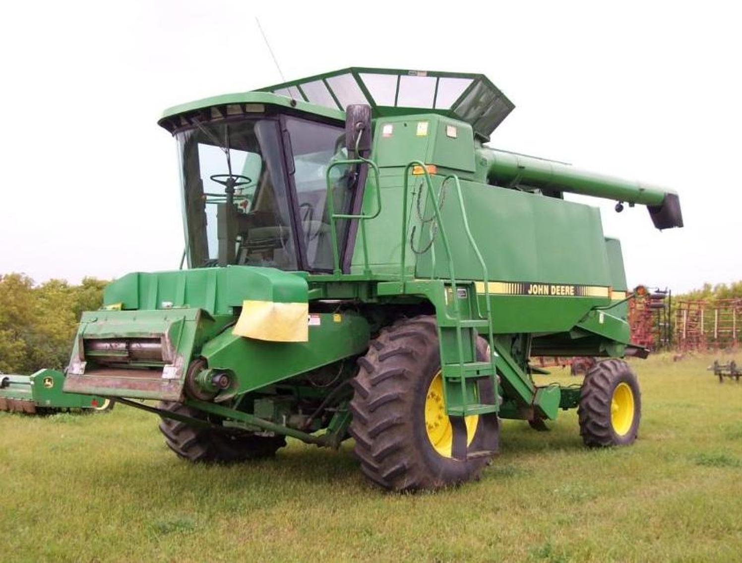Farm Machinery: John Deere 9500 Combine, John Deere Flex Head and Corn Head, 2002 New Holland LS 170 & Attachments