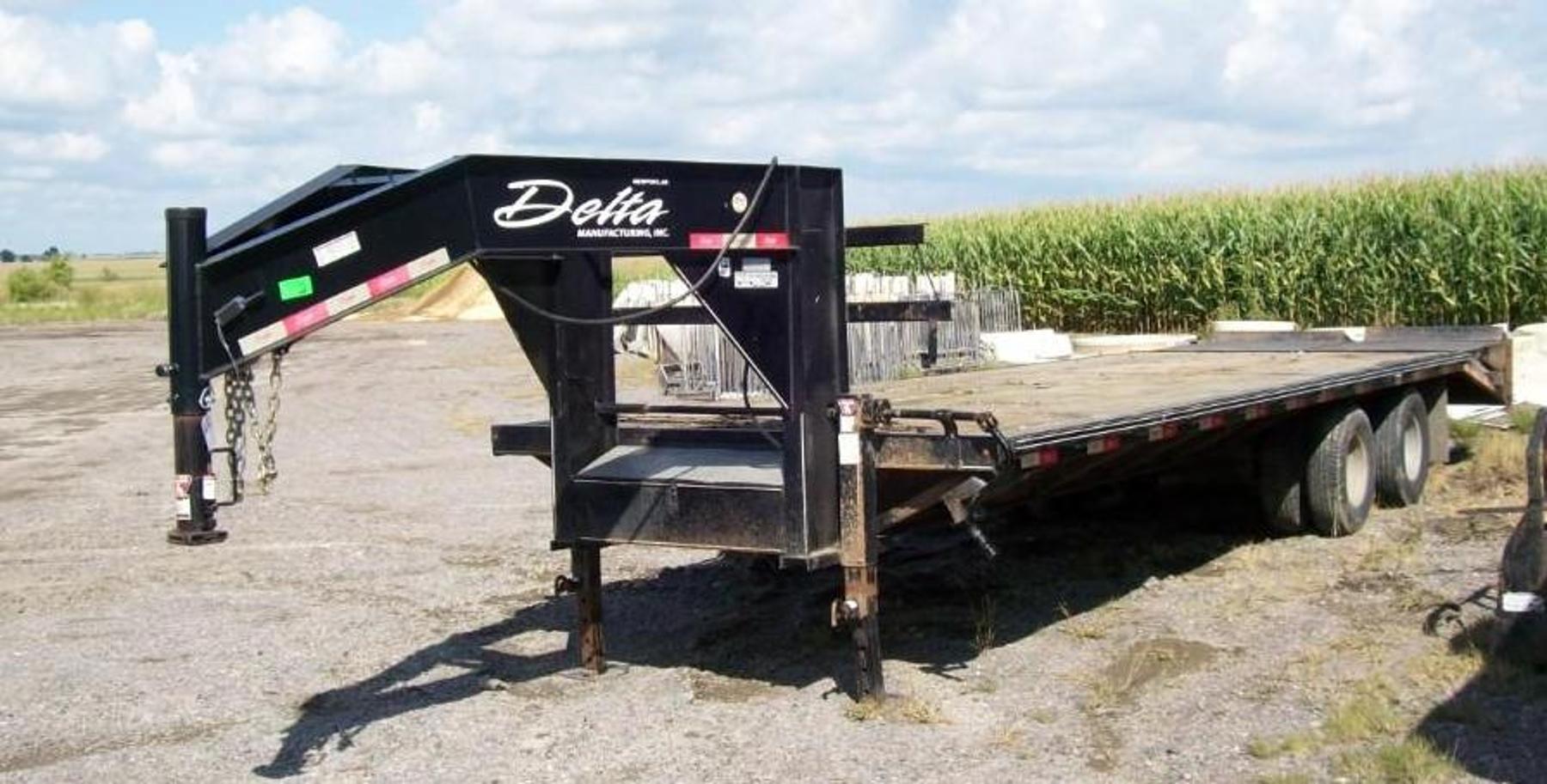 John Deere 325 Skid Steer, 2015 Delta 28' Gooseneck Flatbed, 2013 Sooner Aluminum Stock Trailer & Attachments