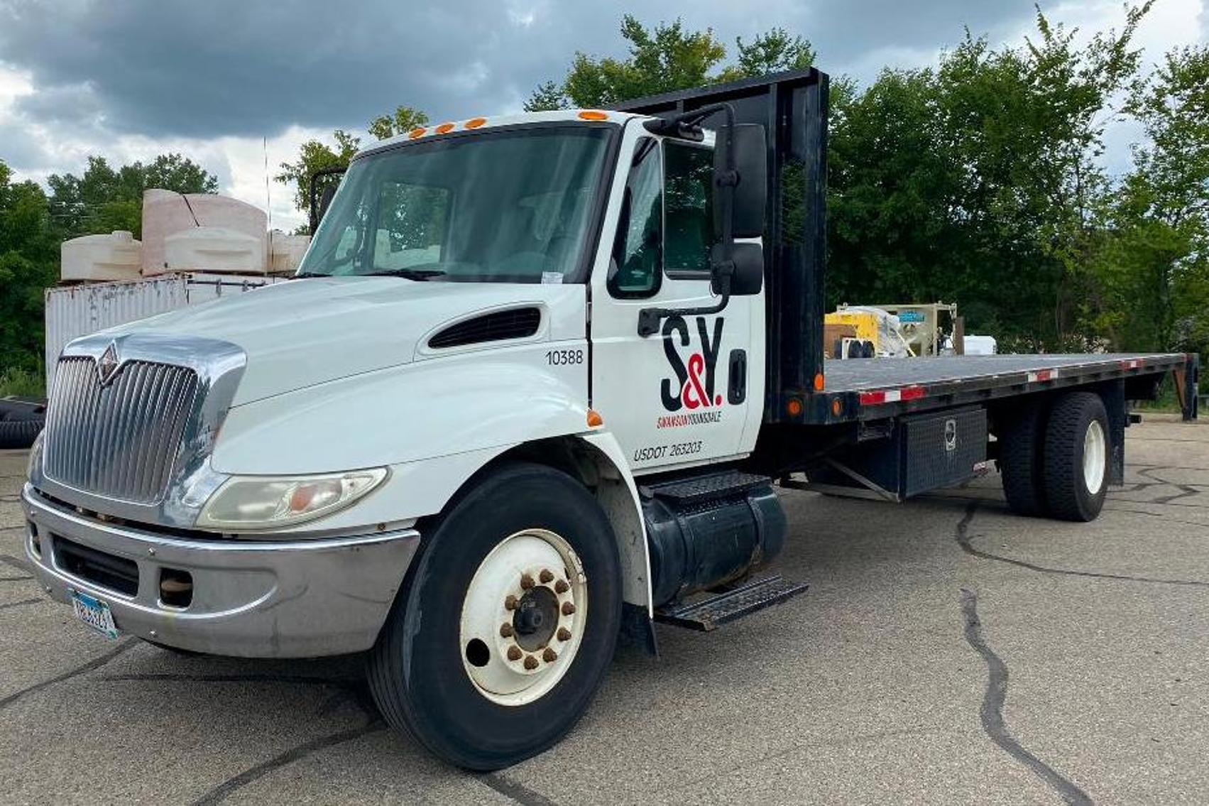 IH 4900 110' Boom Truck, 2000 Freightliner Semi With Cat 3406E 2WS Engine, Talbert 48' Hydraulic Sliding Axle Trailer, 97 Ford Super Duty Dump Truck With 33K Miles, Air Compressor, Tennant Sweeper, IH Flatbed With Liftgate