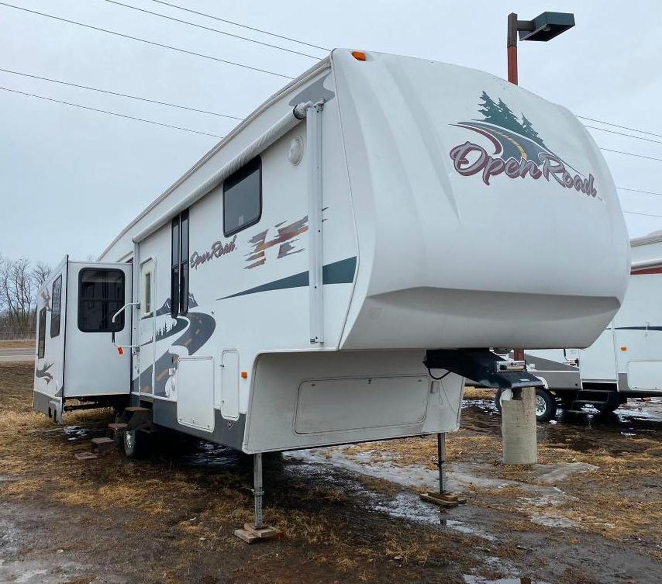 33 Campers: (1) Park Model, (14) 5th Wheels,  (18) Travel Trailers