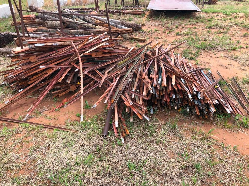 QTY OF STEEL FENCE STAKES & ROLLS OF BARBED WIRE