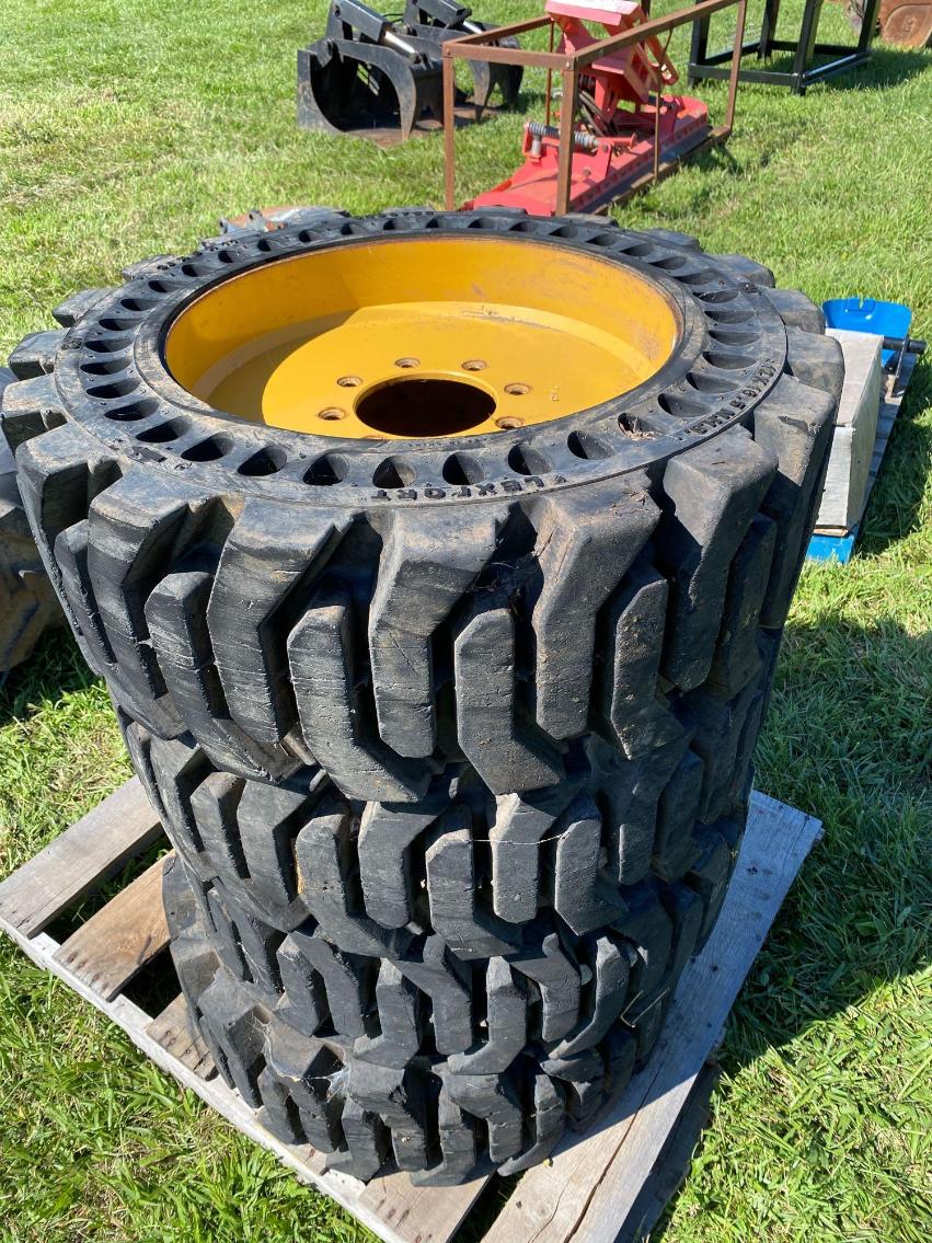 Image for 4 12x16.5 NH Skid Steer Tires and Wheels 