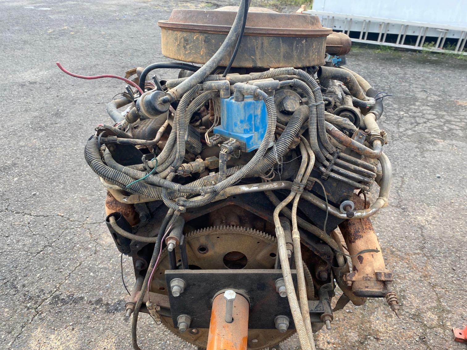 Image for 1986 Chevy 5.7L Complete Engine - Per Seller 85K, Ran when removed.  Comes w/Engine Stand