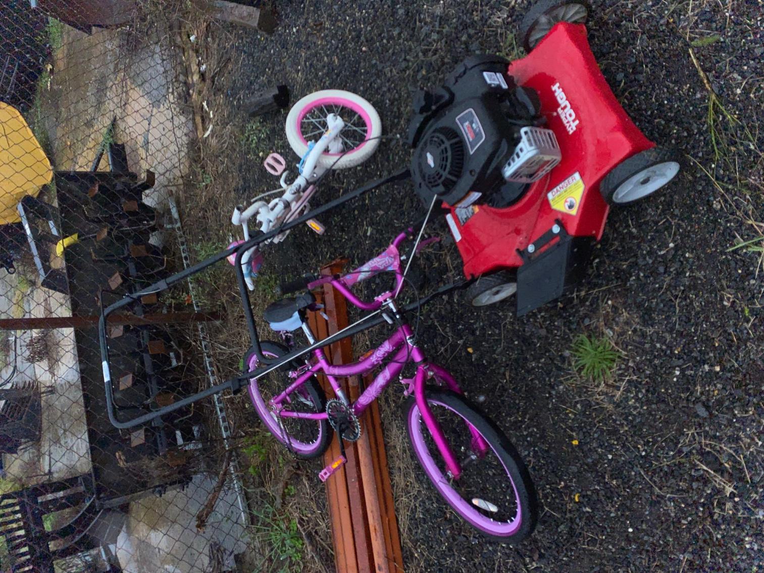 Image for 2 Kids bicycles and push mower in unknown condition