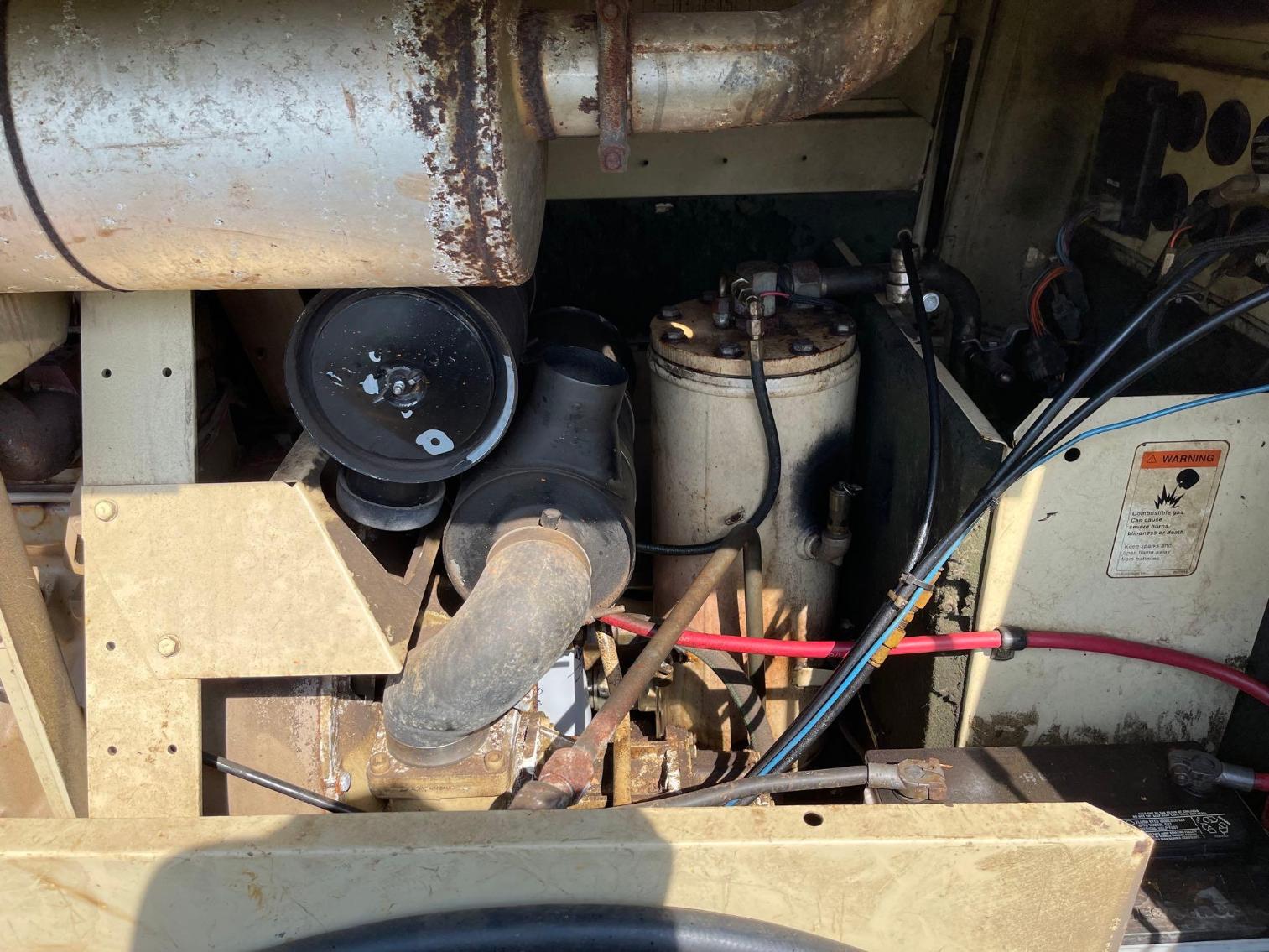 Image for Ingersoll Rand 185 Compressor 1656 hours, new tires, runs out well per seller