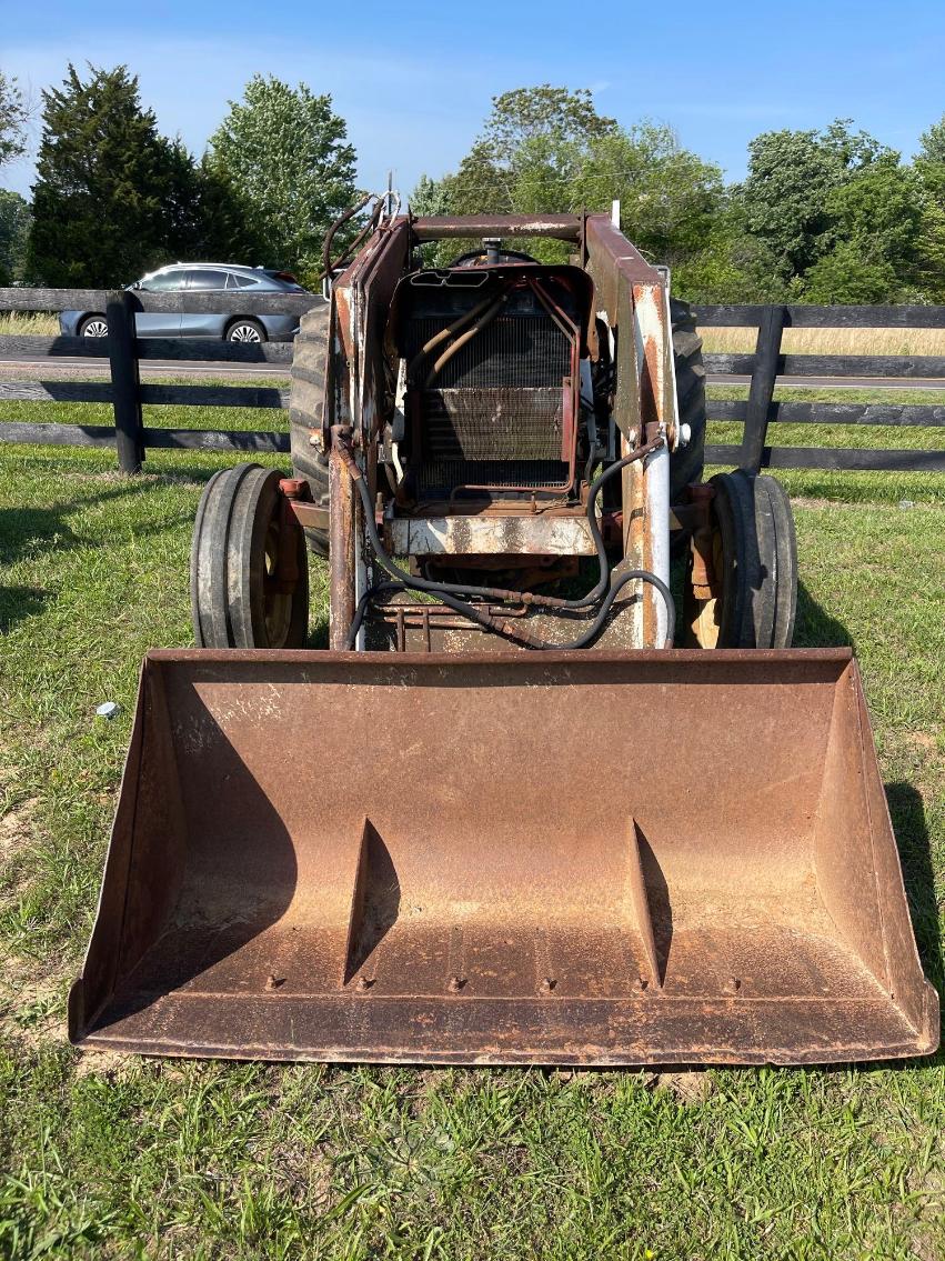 Image for International 574 w/ 1850 Loader, missing grill and battery 