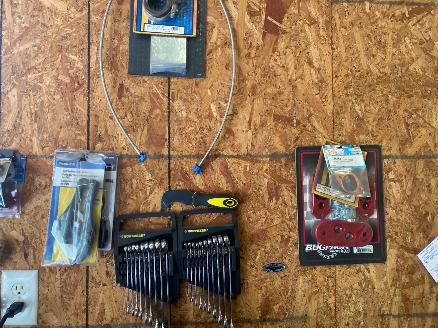 Image for Contents of Left Garage Wall B/N Windows & Various Tools, Wrench Sets, Cut Off Wheels