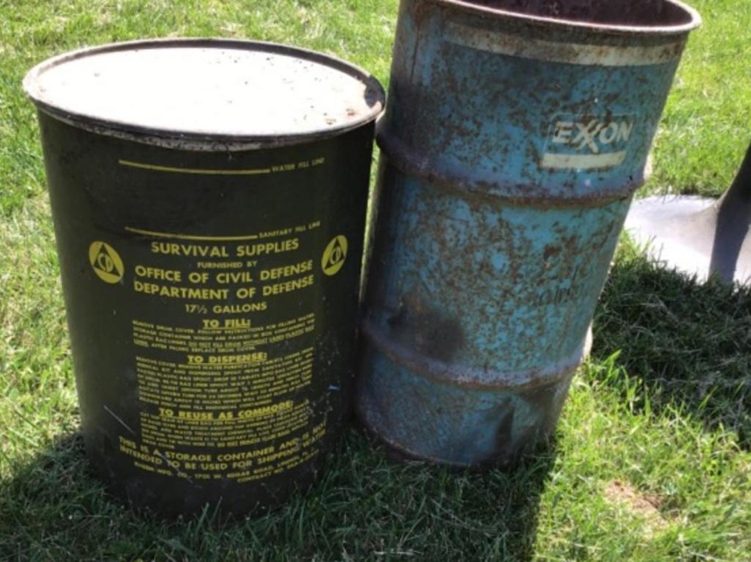Image for Civil Defense Barrel 17.5 Gallons, Small Metal Drum, And A Brunswick Table Support