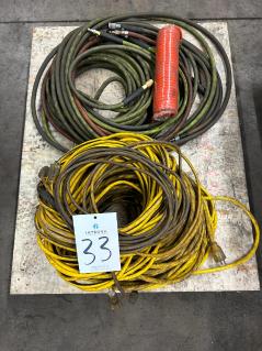 lot-of-assorted-110-volt-extension-cords-and-air-hoses