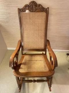 uniquely-carved-rocker-with-cane-back-and-seat