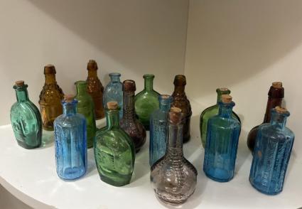 collection-of-small-glass-bottles