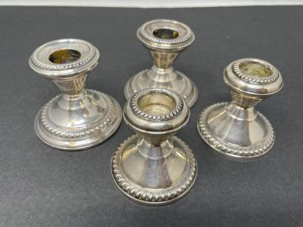 two-pairs-of-weighted-sterling-candleholders