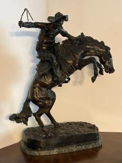 the-bronco-buster-bronze-sculpture-by-remington